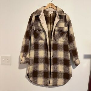 Skies are blue brown and cream plaid shacket